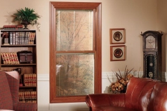 Double-Hung Window With A Wooden Frame Nestled Near The Corner Of A Common Space