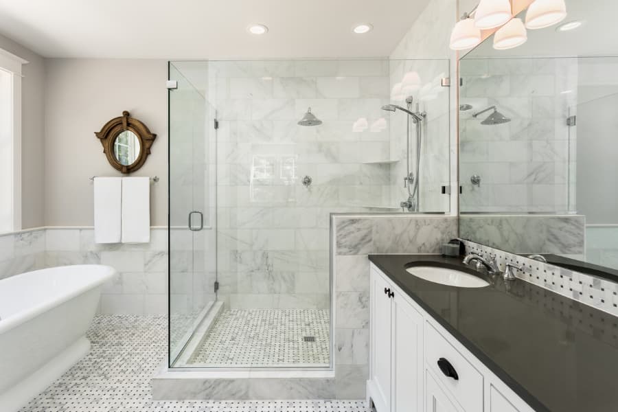 Master bathroom with glass shower door and high-end furnishings